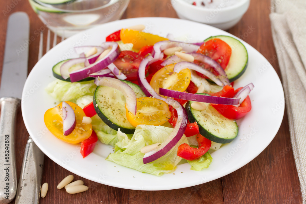 salad with nuts on plate salad with nuts on plate