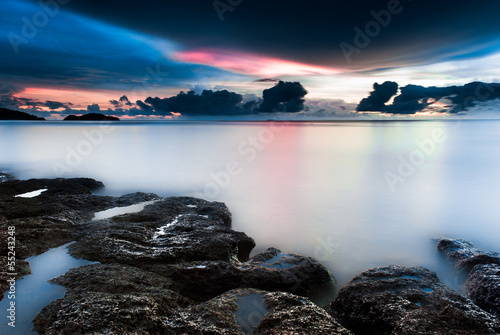 Sunset on the rocky beach