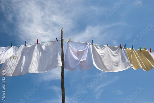 Tableau sur toile Laundry drying on the rope outside