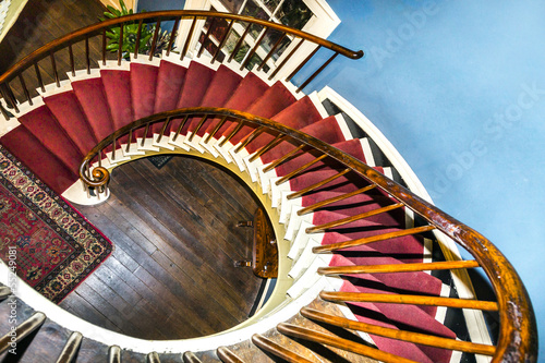 Spiral stairs to upper bedrooms and parlors