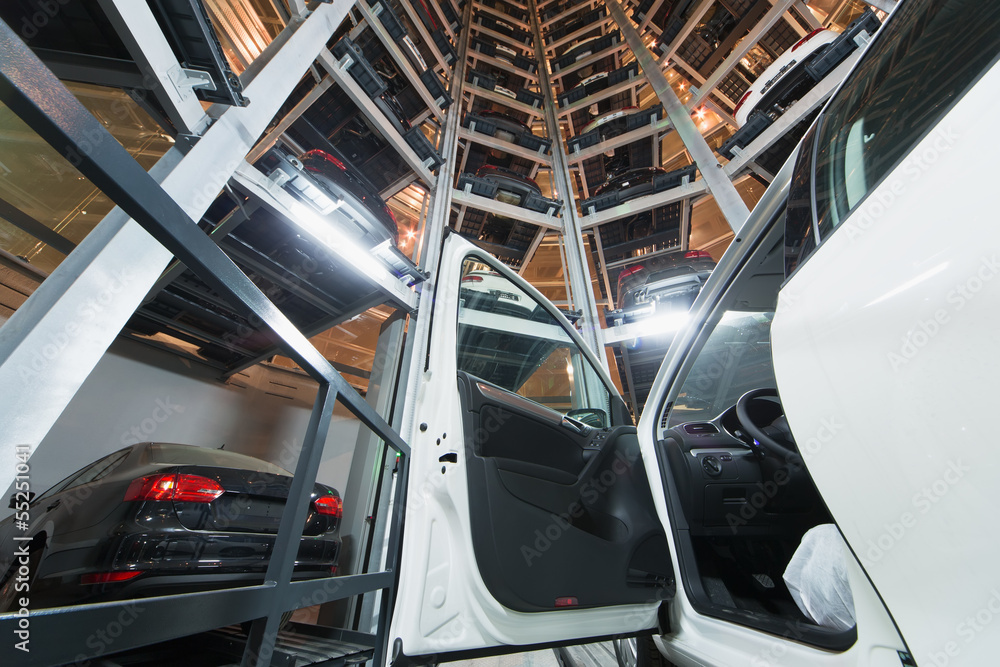 Fototapeta premium car with open door against background of other cars