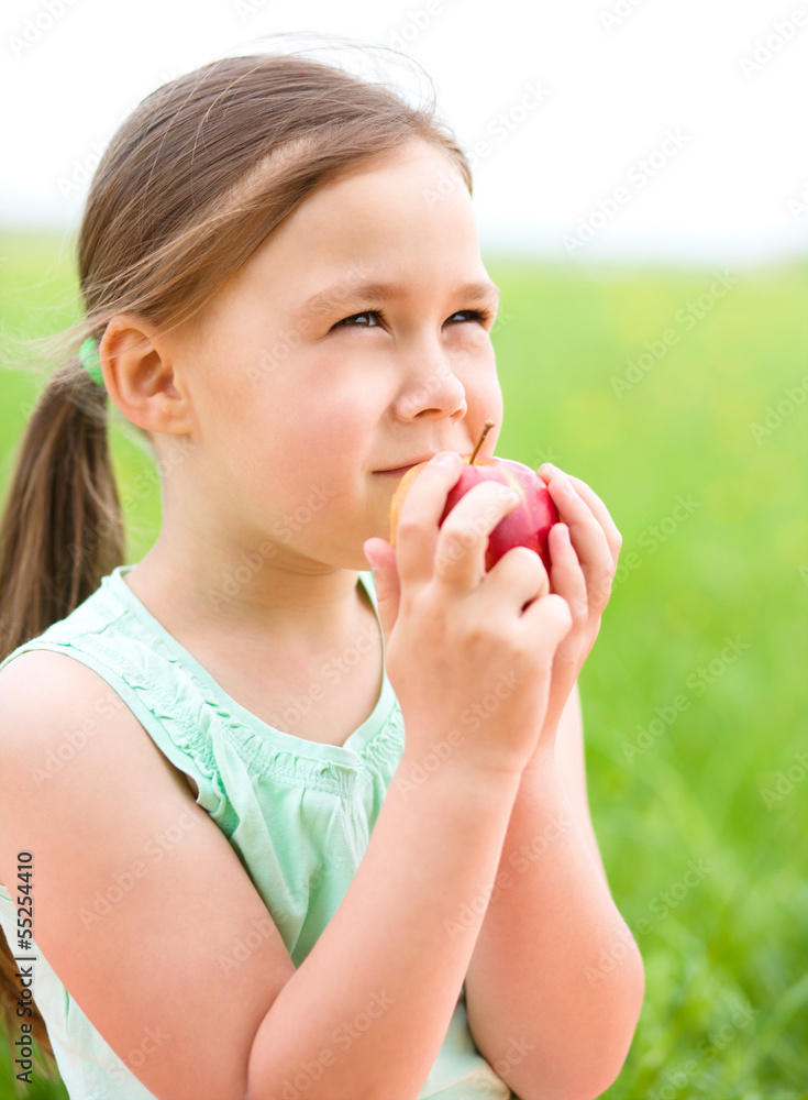 Portrait of a little girl with apple Portrait of a little girl with apple