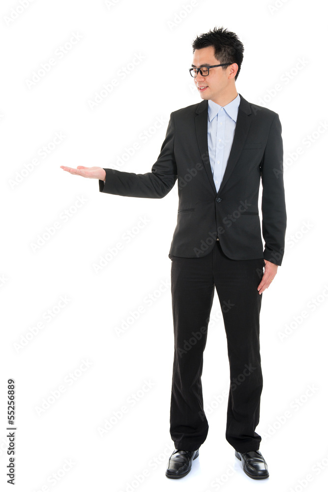 Asian business man hand showing blank empty space Asian business man hand showing blank empty space