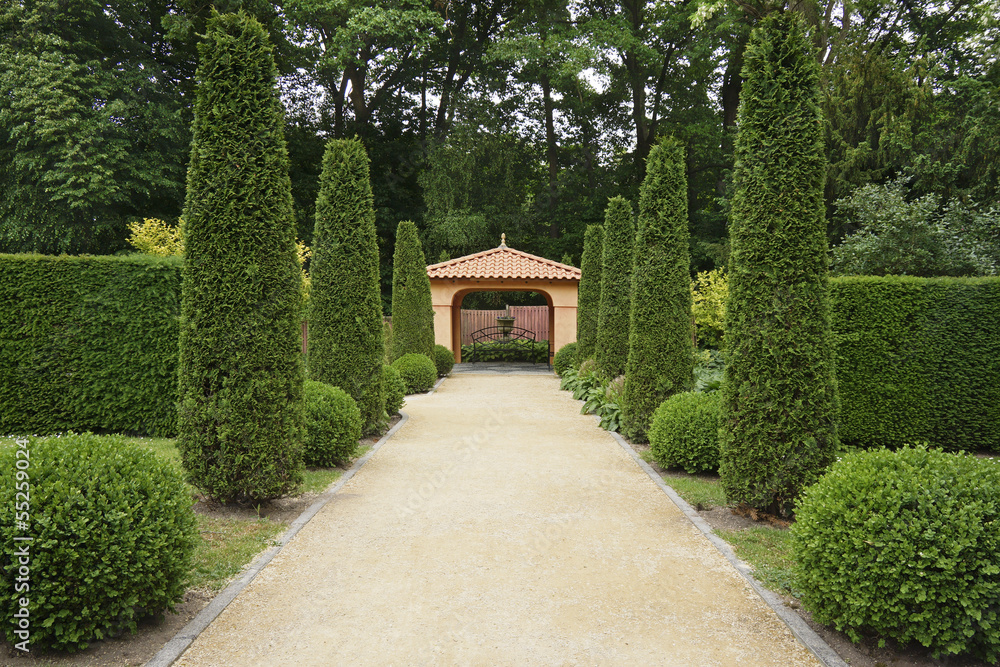 Path in Italian formal garden leading to a pavillion