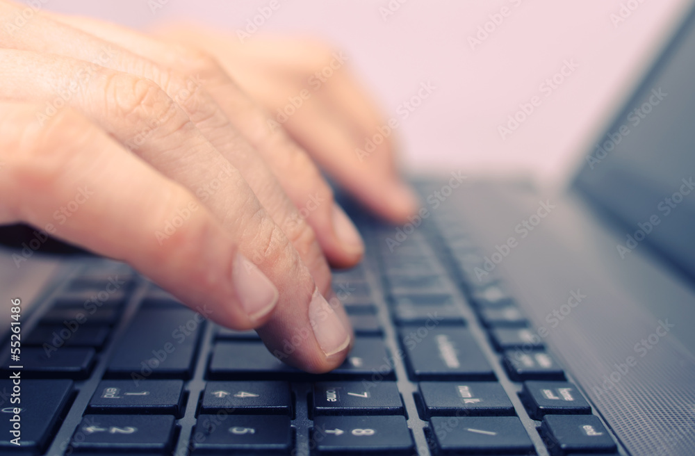 Detail of female fingers typing on keyboard. Selective focus. Detail of female fingers typing on keyboard. Selective focus.