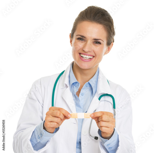 Smiling doctor woman with patch
