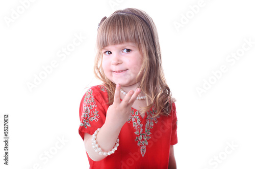 3 years old girl shows how old are she.