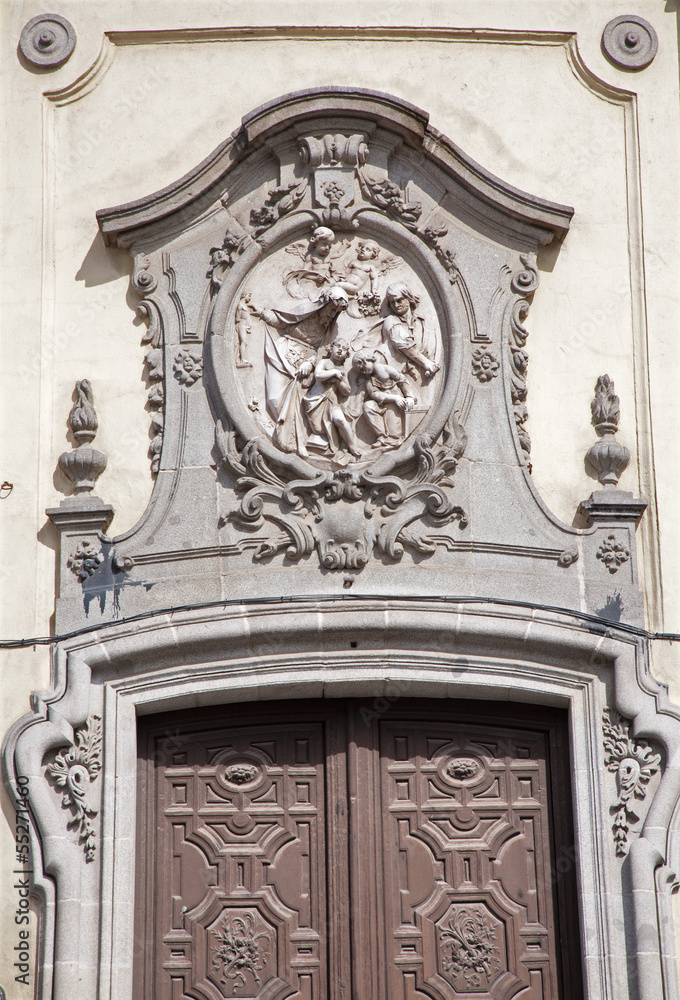 Madrid - Relief and baroque portal San Miguel church