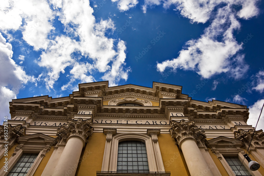 Italian basilica facade and blue sky