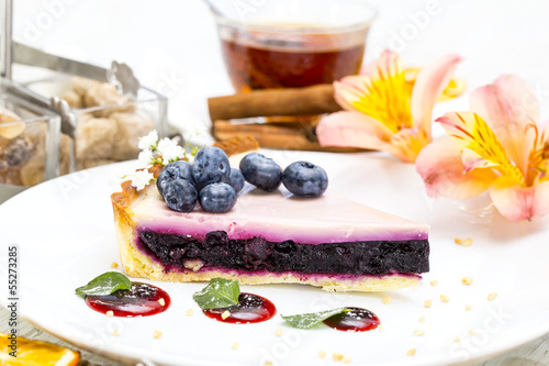 piece of blueberry pie on a table in a restaurant