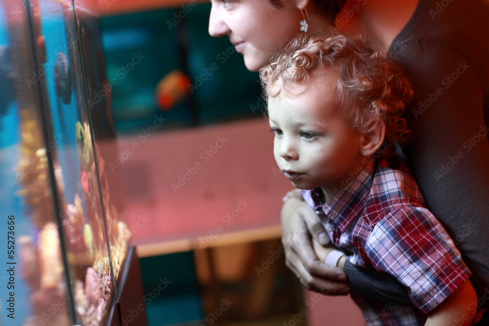 Mother and toddler at aquarium Mother and toddler at aquarium