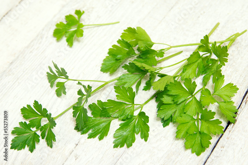 parsley on wooden table
