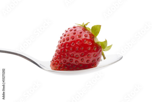 Fresh strawberry in front of a white background.