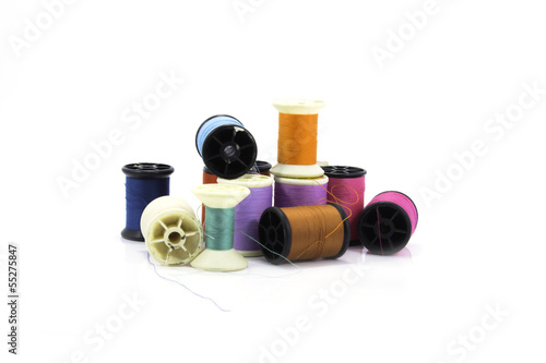 bobbins of thread on a white background