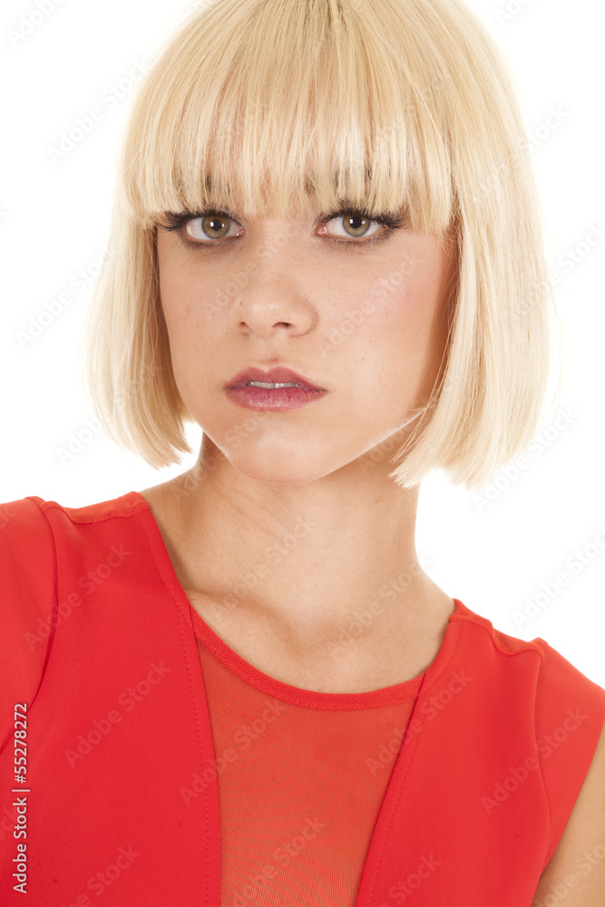 Woman red top serious expression