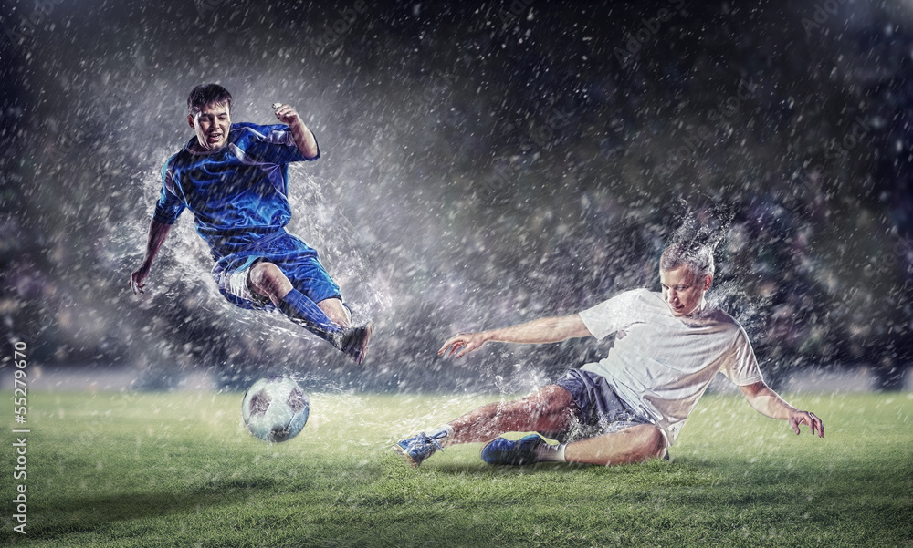 Naklejka premium two football players striking the ball