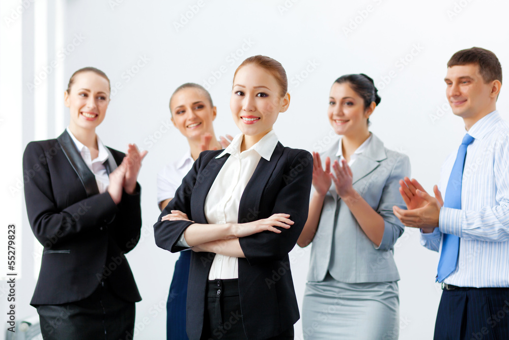 Asian business woman with colleagues
