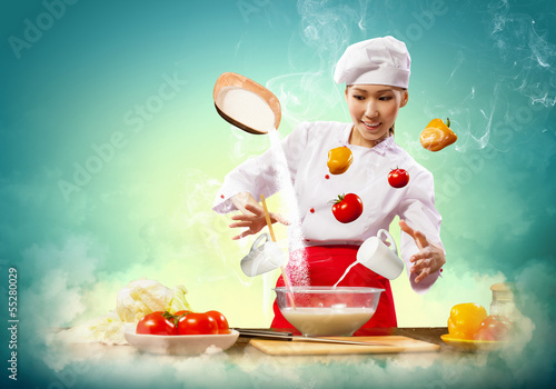 Asian female cooking with magic photo