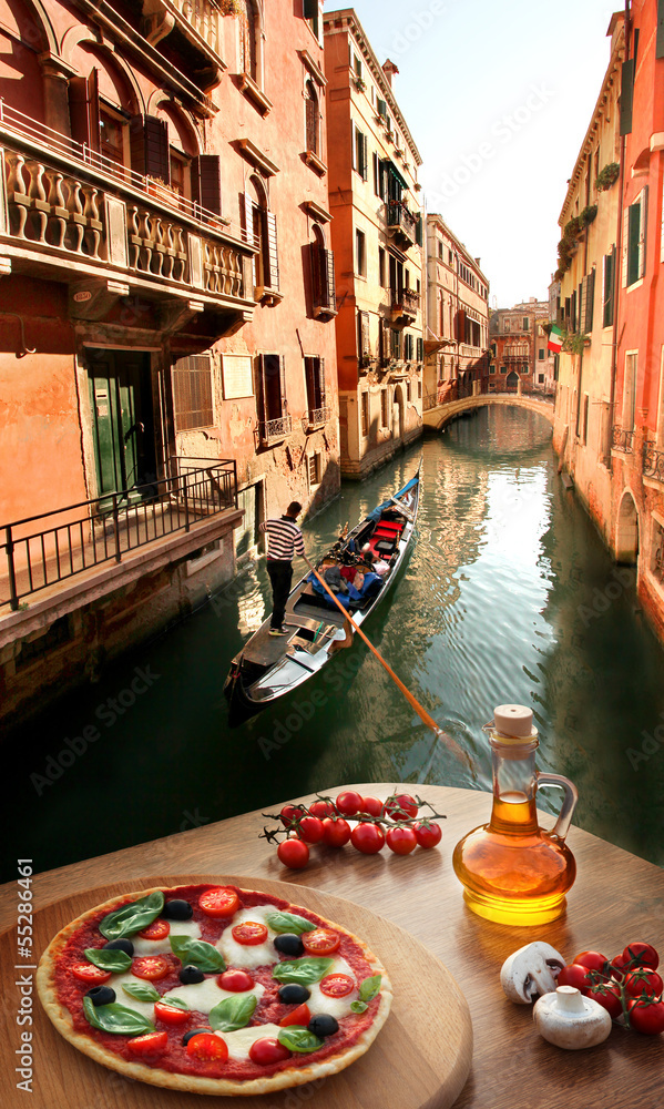Fototapeta premium Venice with Italian pizza against canal in Italy