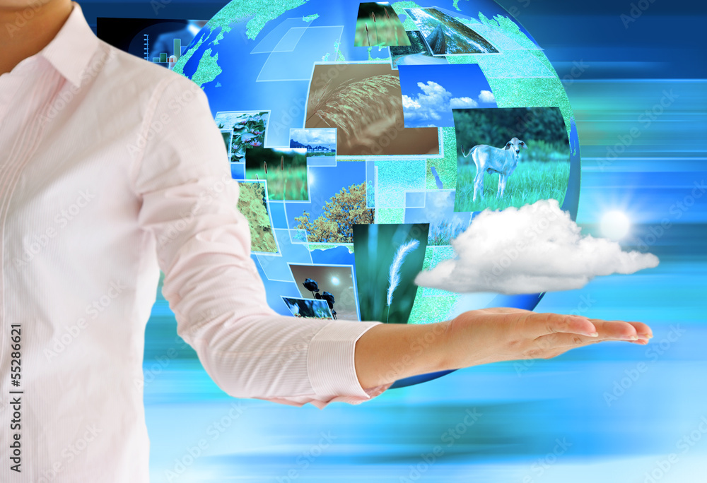 hand holding a cloud on world nature backgound hand holding a cloud on world nature backgound