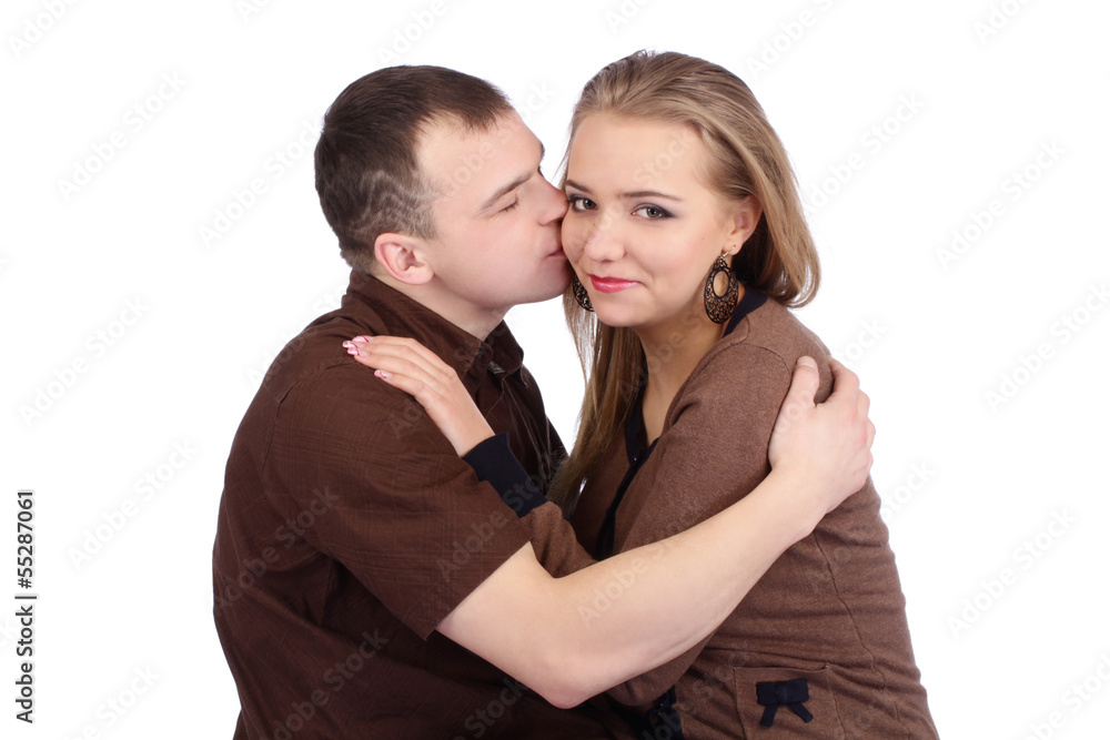 Loving couple embracing on white background Loving couple embracing on white background
