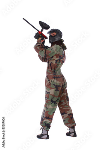 Studio shot of paintball player isolated over white background