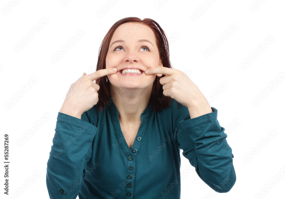 Teenage girl showing her teeth Teenage girl showing her teeth