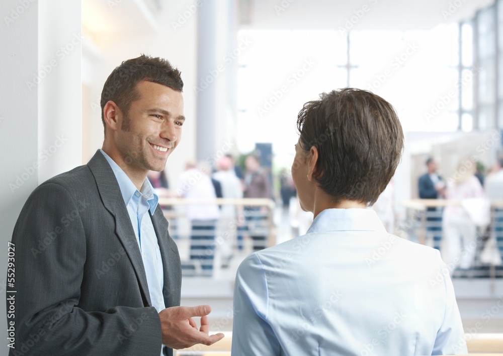 Businesspeople talking outdoors Businesspeople talking outdoors