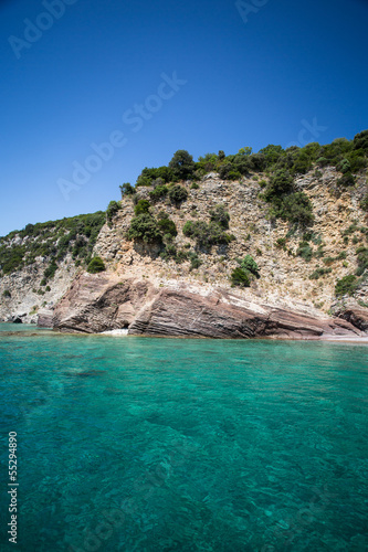 layered rocks and clear sea © zorandim75