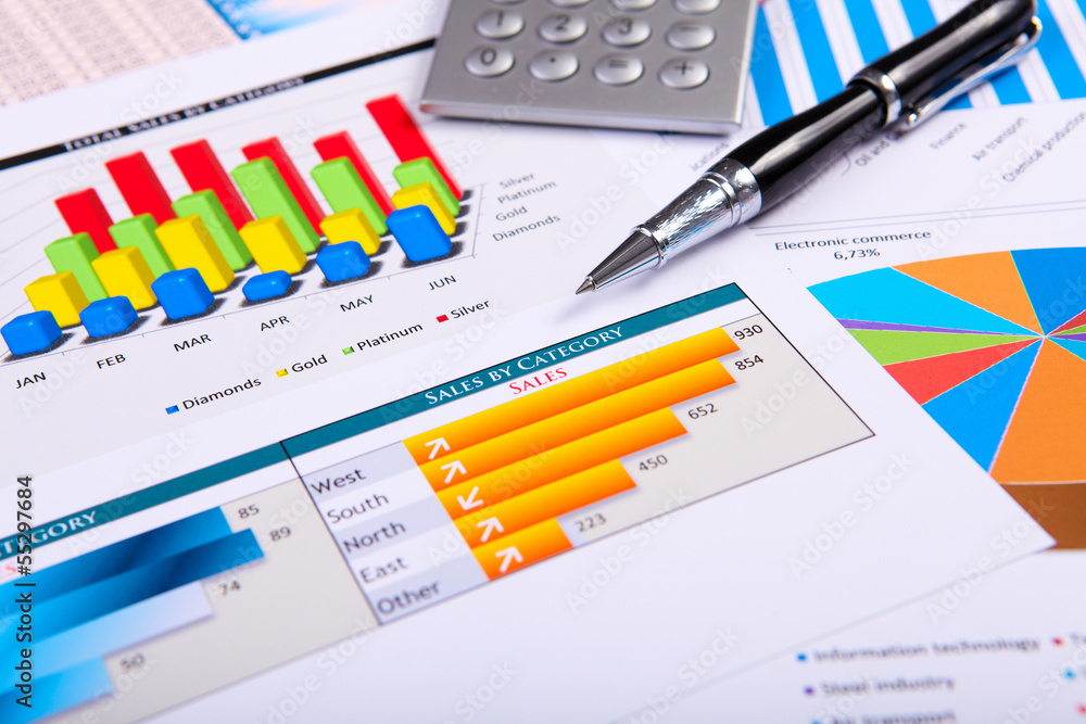 Financial papers on the table Financial papers on the table