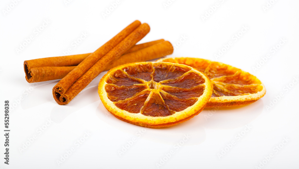 dry orange and cinnamon, on a white background dry orange and cinnamon, on a white background