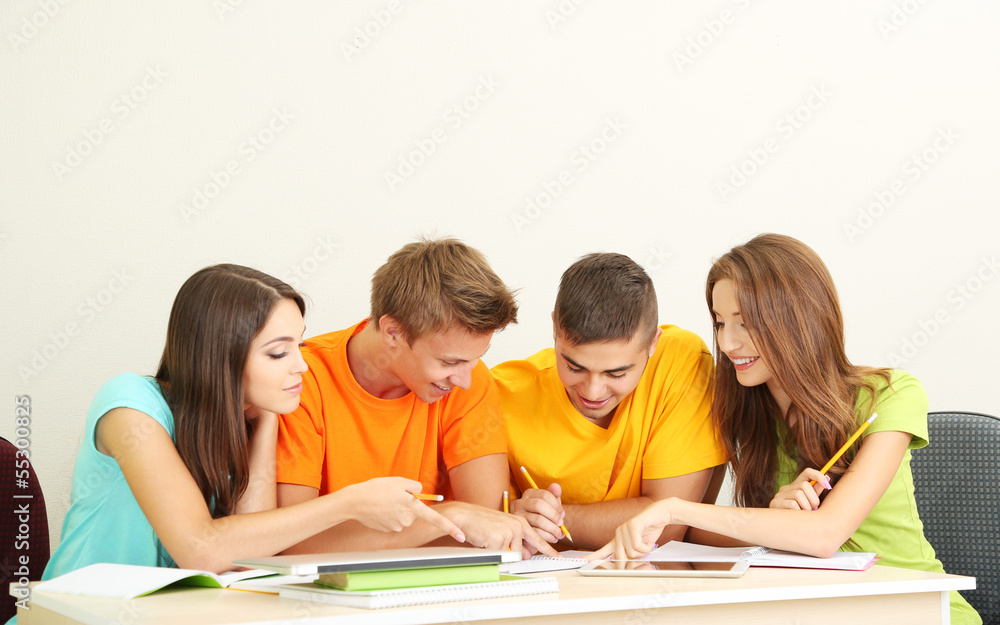 Group of young students sitting in the room