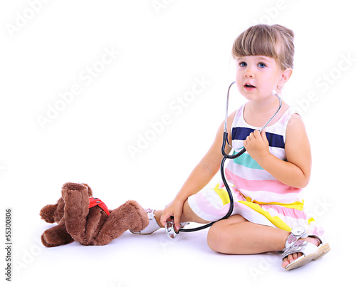 Little cute girl playing do...