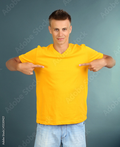 T-shirt on young man, on gr...