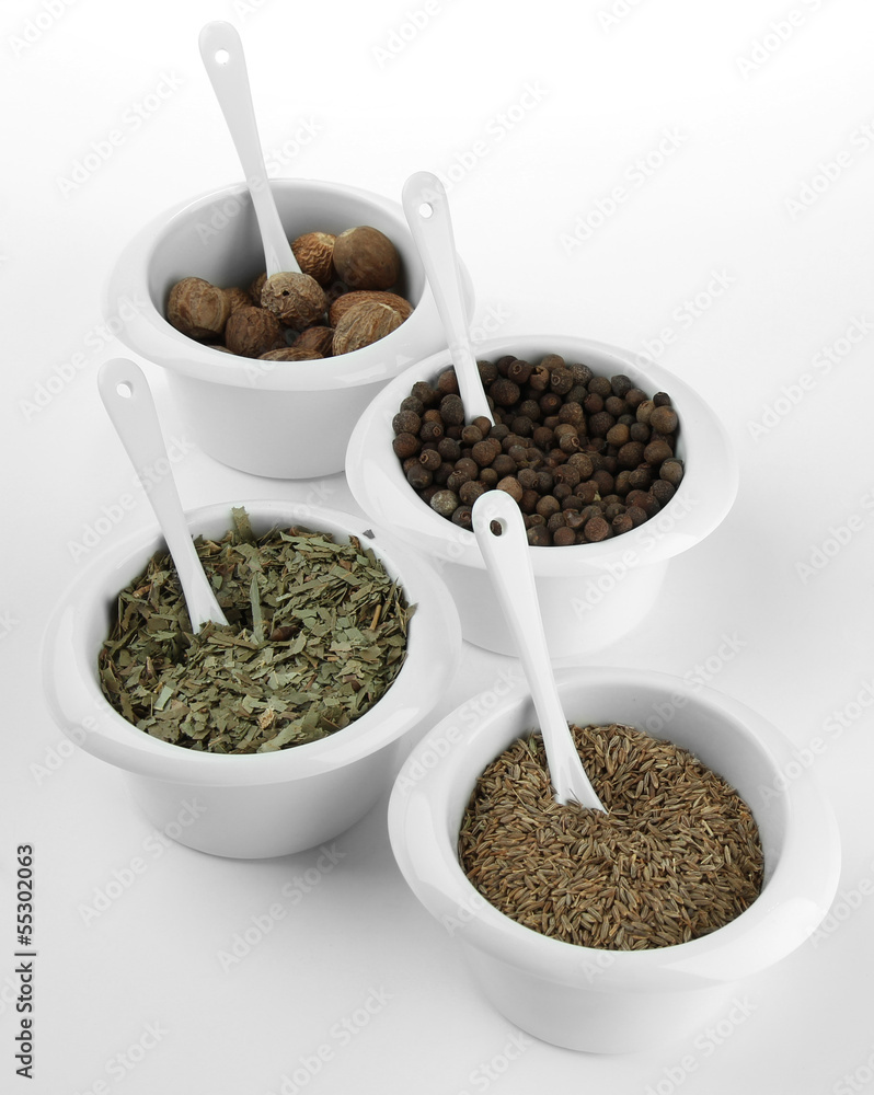 Assortment of spices in white bowls, Assortment of spices in white bowls,