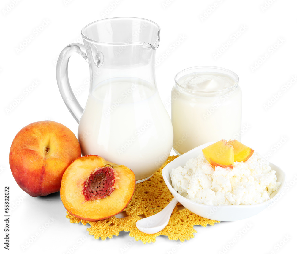 Fresh dairy products with peaches isolated on white Fresh dairy products with peaches isolated on white