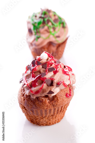 cupcake with buttercream icing and sprincles photo