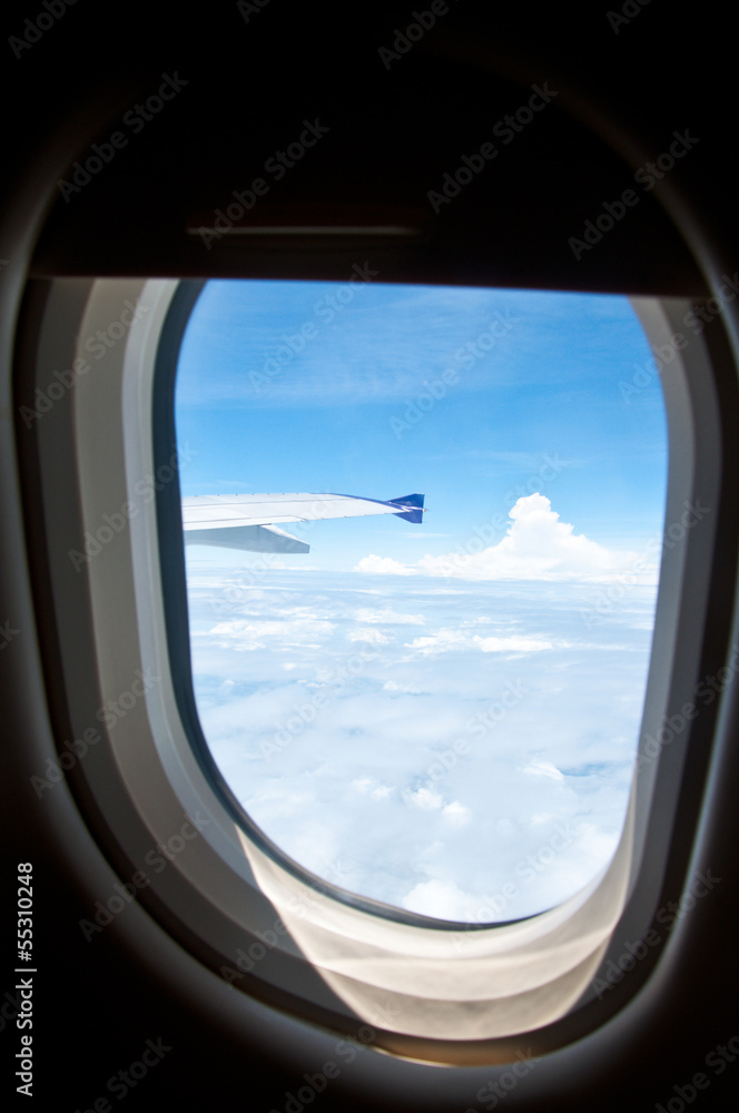 Classic image through aircraft window onto airplane