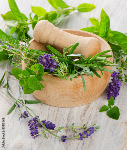 Mortar with fresh herbs