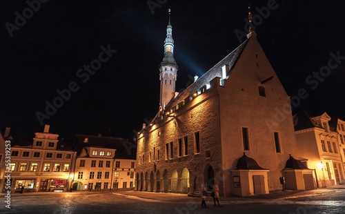 Illuminated city hall at night. Old town of Tallinn, Estonia