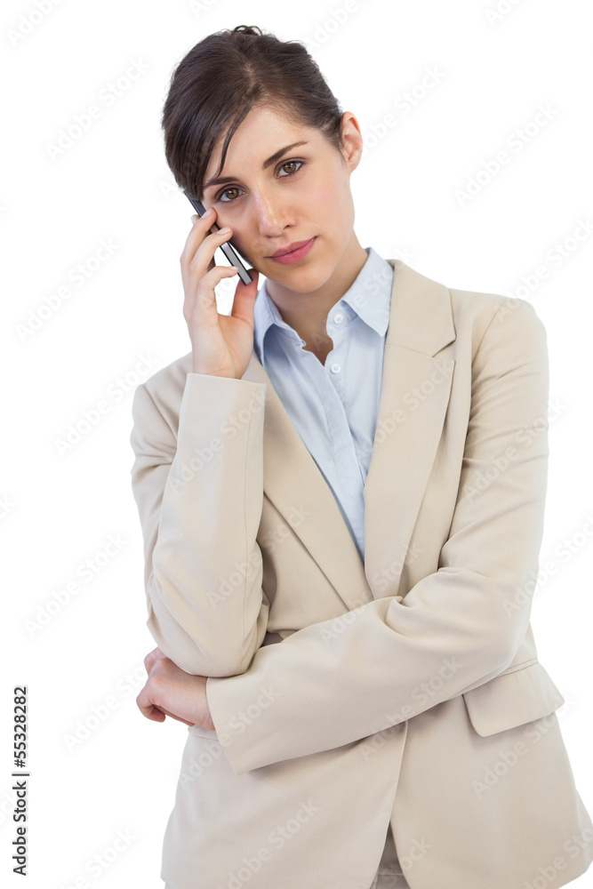 Serious businesswoman on the phone Serious businesswoman on the phone