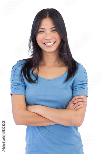 Smiling asian woman with arms crossed © WavebreakmediaMicro