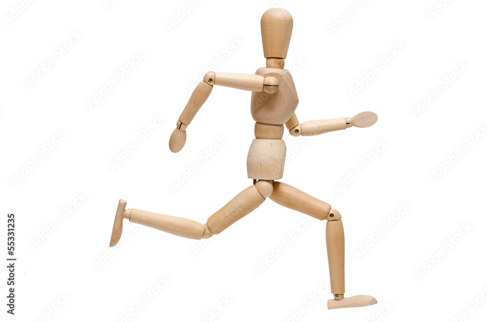 Weiss isolierte Figur aus Holz beim rennen Weiss isolierte Figur aus Holz beim rennen