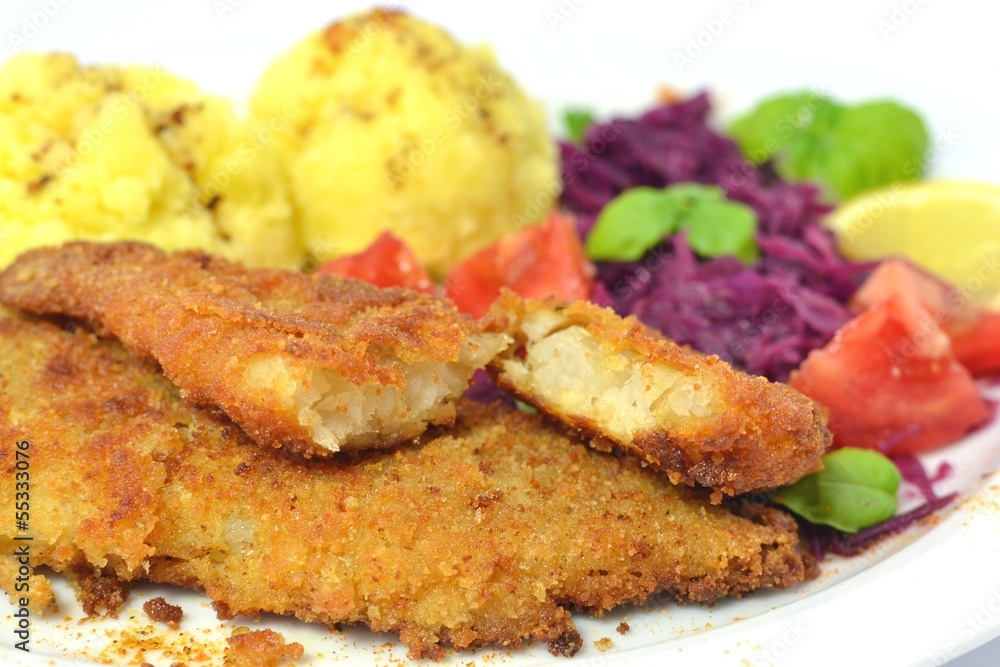 pollock fried with potatoes and vegetables pollock fried with potatoes and vegetables