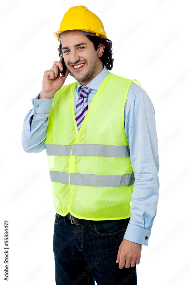 Happy site engineer communicating Happy site engineer communicating