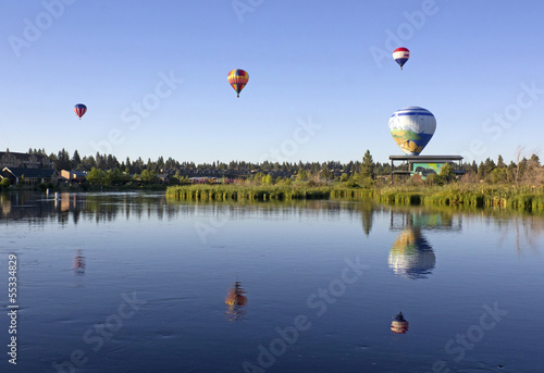 Many hot air balloons over the Deschutes River, Bend, Oregon