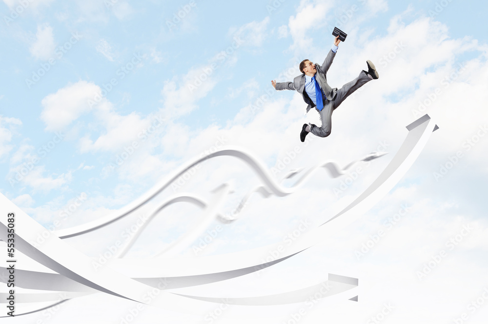 Businessman jumping