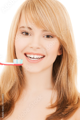 teenage girl with toothbrush
