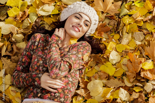 Young woman at autumn forest