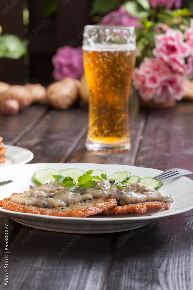 potato pancakes with mushroom sauce and beer potato pancakes with mushroom sauce and beer